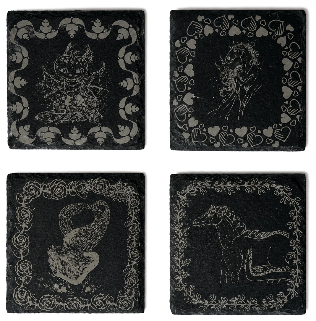 Four engraved slate drink coasters with illustrated designs